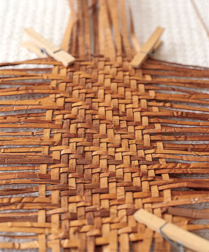 A basket begins to take shape under Daugherty’s expert hands.